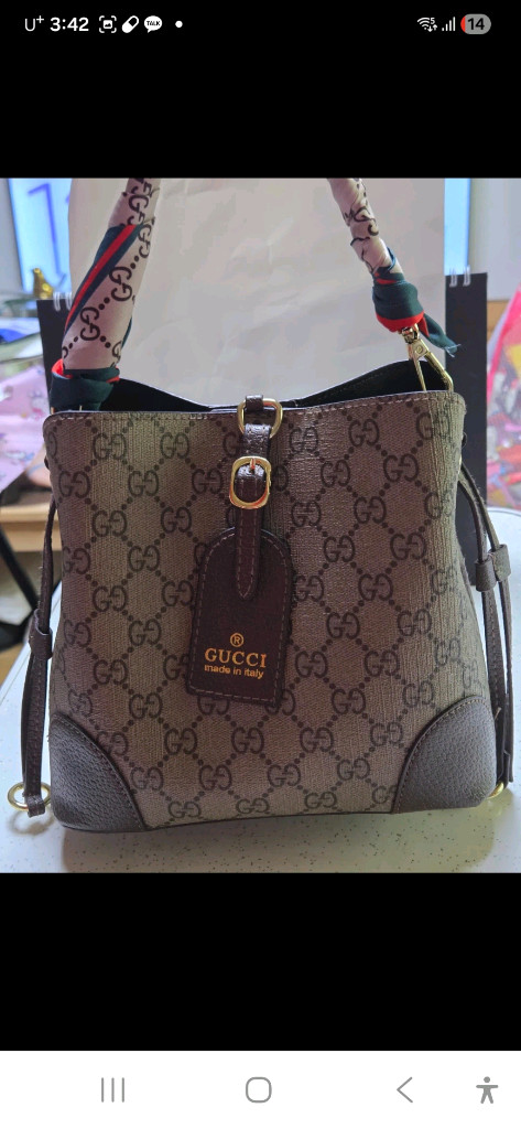 구찌 GG 로고 미니 버킷백 브라운(중고) 이미지