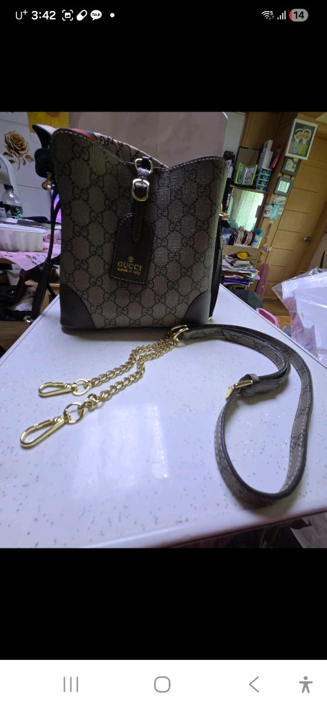 구찌 GG 로고 미니 버킷백 브라운(중고) 이미지