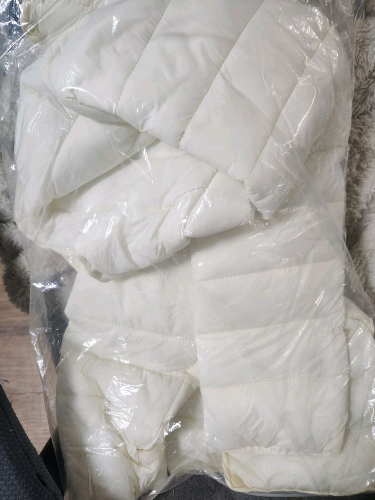 여성 아이보리 경량패딩 이미지