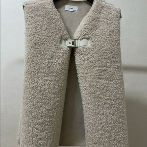 아이보리 무스탕 조끼