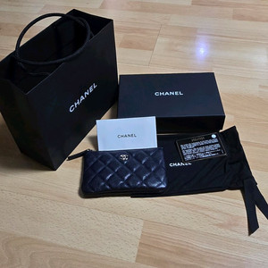 샤넬 클래식 캐비어 미니 파우치 네이비