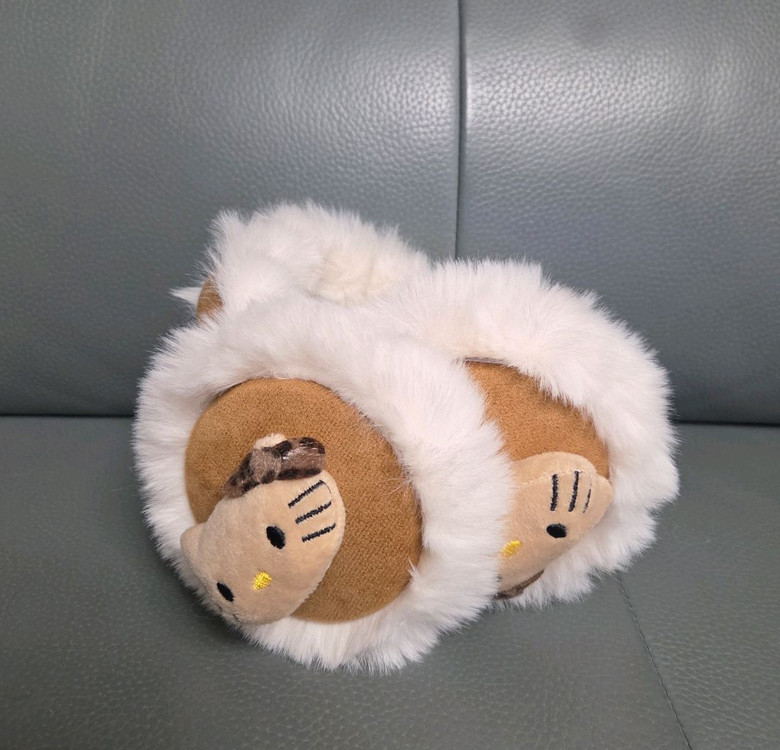 헬로키티 태닝 어그 털 귀마개 새상품--1