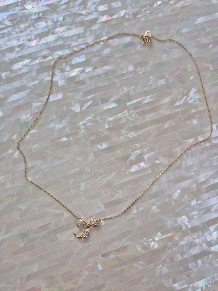 제이에스티나 14k 옐로골드 리본목걸이--1