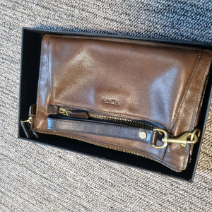 투미 가죽 손가방 파우치 클러치백