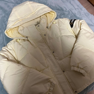 내셔널지오그래픽 여성 숏패딩 덕다운 레몬컬러 이미지