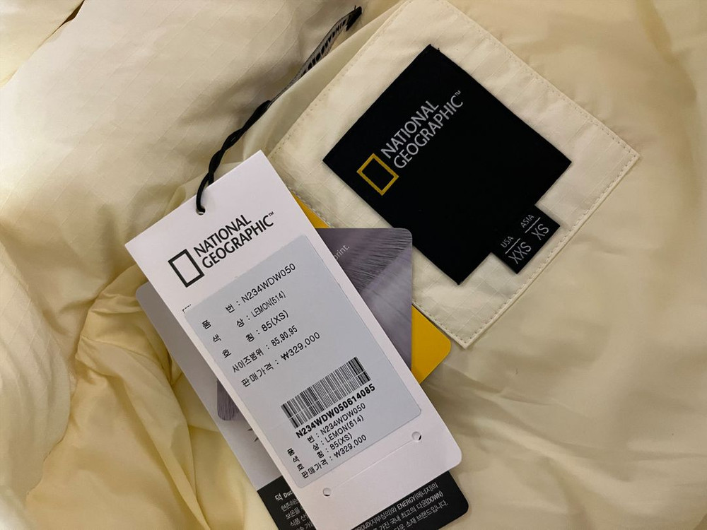 내셔널지오그래픽 여성 숏패딩 덕다운 레몬컬러 이미지