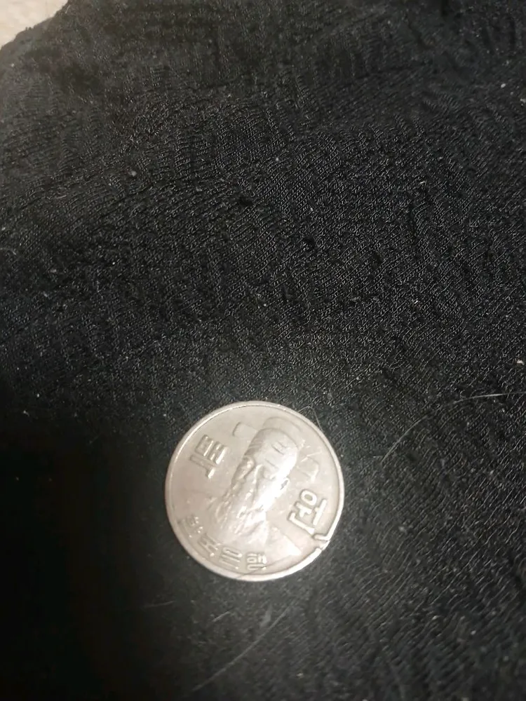 1977년 100원 동전 에러동전 이미지