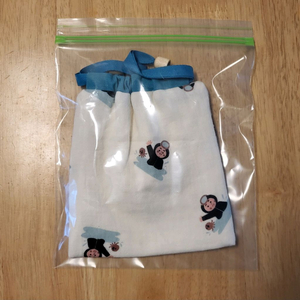 귀여운 해녀 캐릭터가 그려진 복주머니 파우치. 다미사용