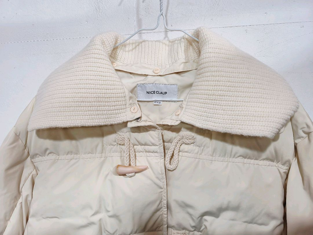 나이스클랍 아이보리 떡볶이 숏패딩--1