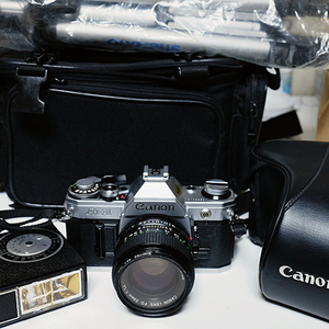 [Canon] 캐논 베스트셀러 AE-1(nFD50mm 1:1.4) 삼각대,플레쉬,가방 팝니다