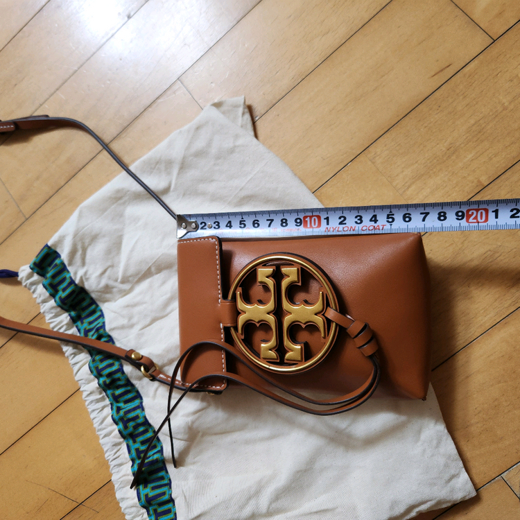 (미사용)토리버치 브라운 색상의 미니 크로스백--1