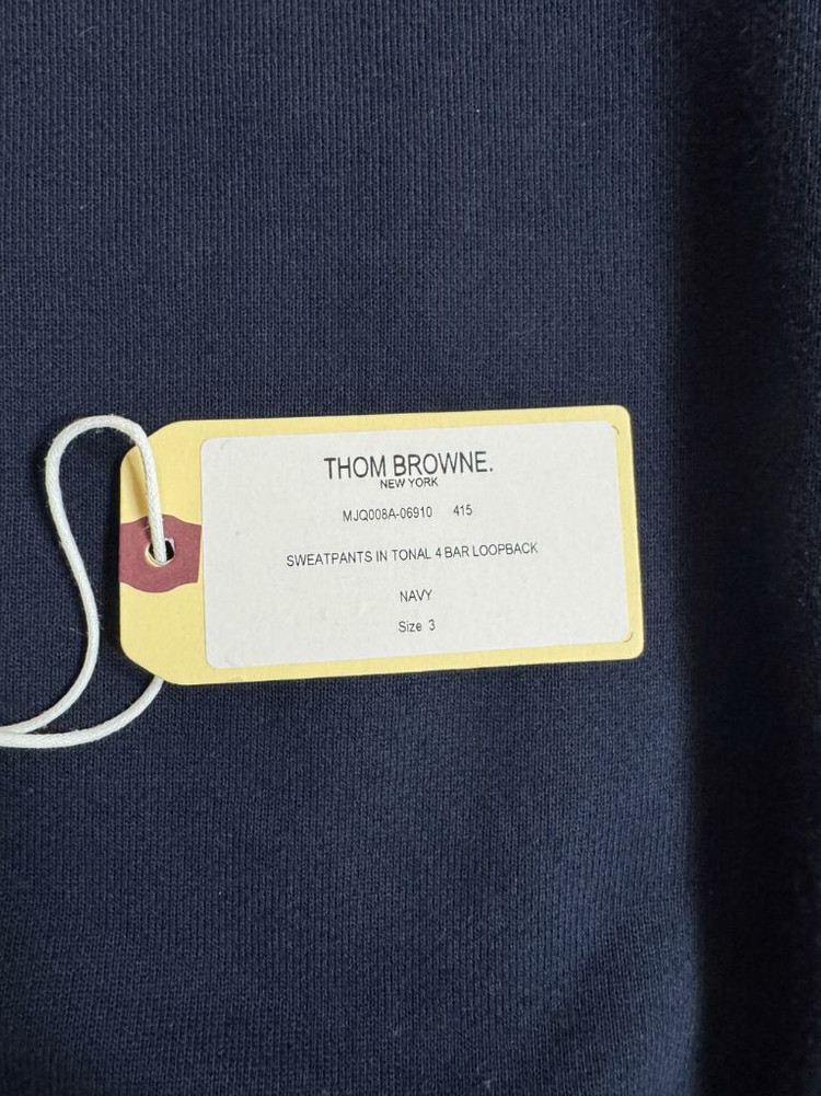 정품(상태조아요,3)톰브라운 남성 토널 사선완장 스웨트팬츠 네이비 남성 바지 MJQ008A 06910 415 이미지