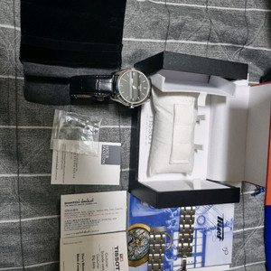 티쏘 쿠튀리에 전자 시계