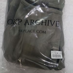 오케이플레이스 시스템 스웨이드 스커트 카키