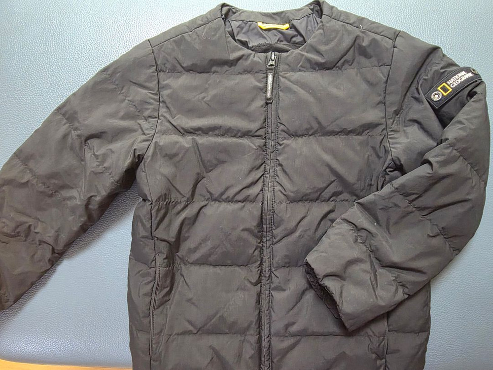 내셔널지오그래픽키즈 경량패딩 블랙 140 팝니다. 이미지