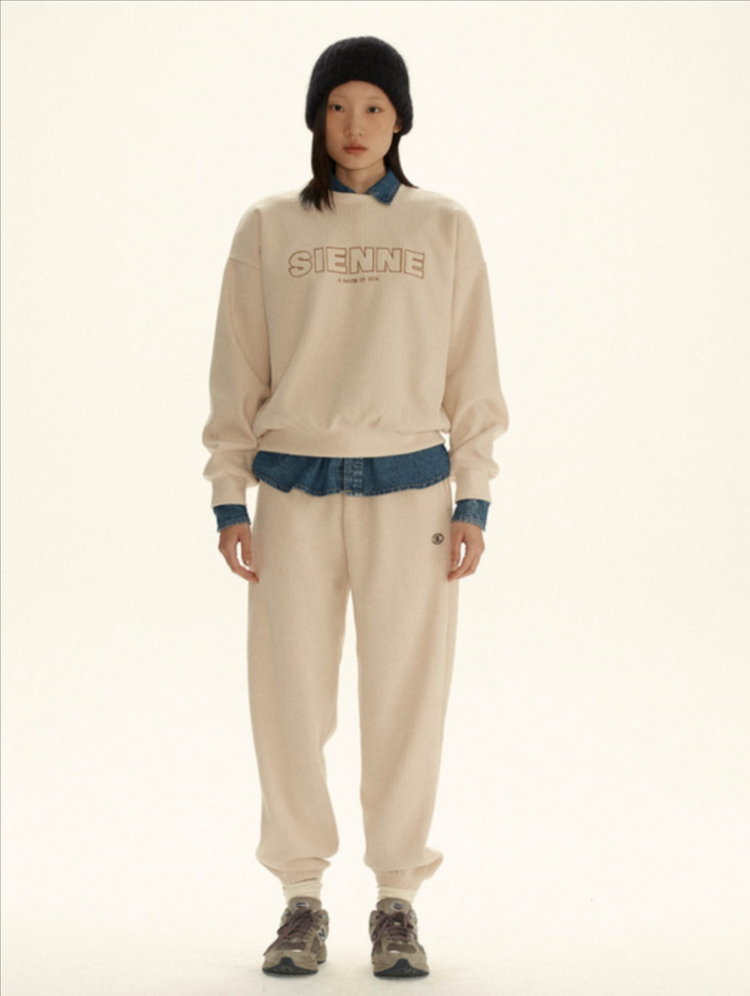 시엔느 심볼 니트 조거 팬츠 크림--1