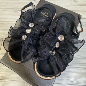 슈콤마보니 샌들