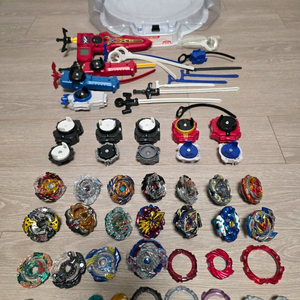 베이블레이드 15개+런처14개+추가 프레임,드라이버14개 +스테디움 1개