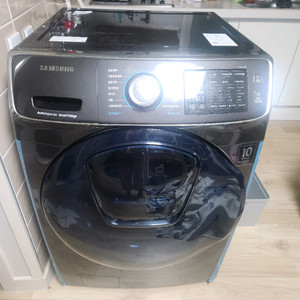 삼성 드럼세탁기 건조가능 세탁완료 WD17N7550TV 블랙캐비어