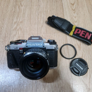 펜탁스 프로그램 plus 바디및 50mm f1.4 A렌즈 셋트 입니다