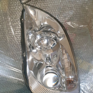 뉴카렌스 전조등 1 대분,헤드라이트 이미지