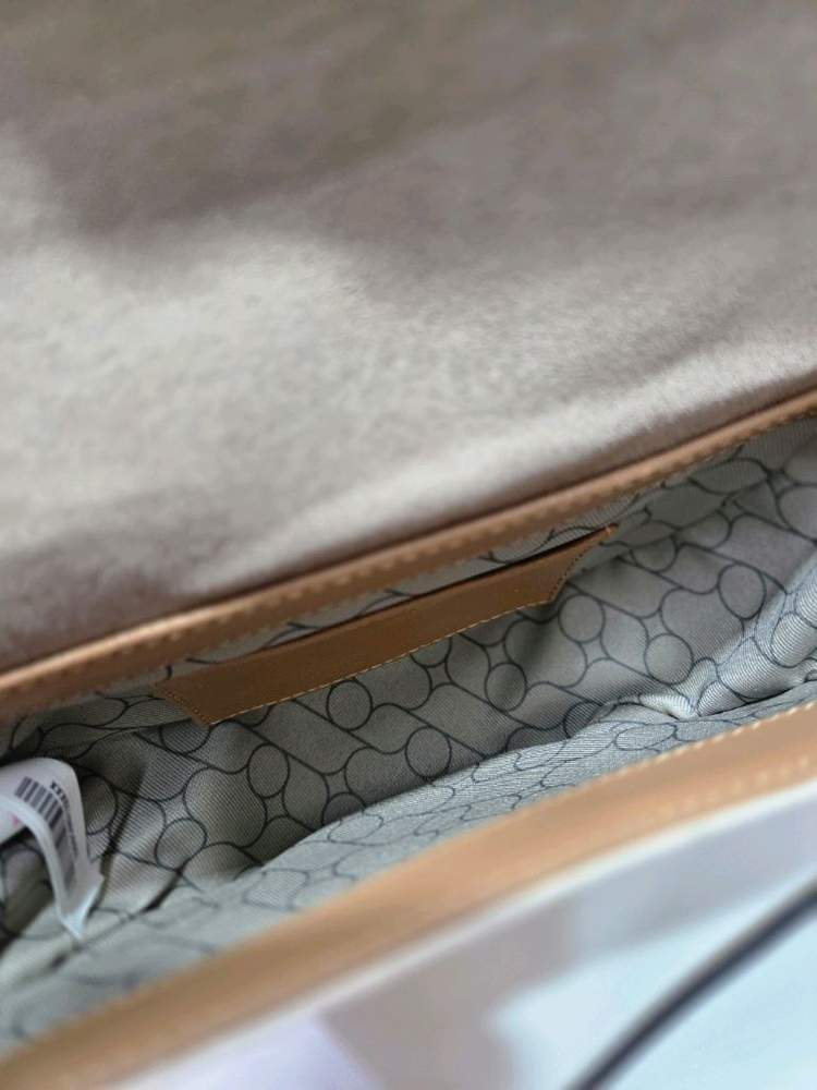 오야니 로티 캔버스 크로스바디 가방 이미지