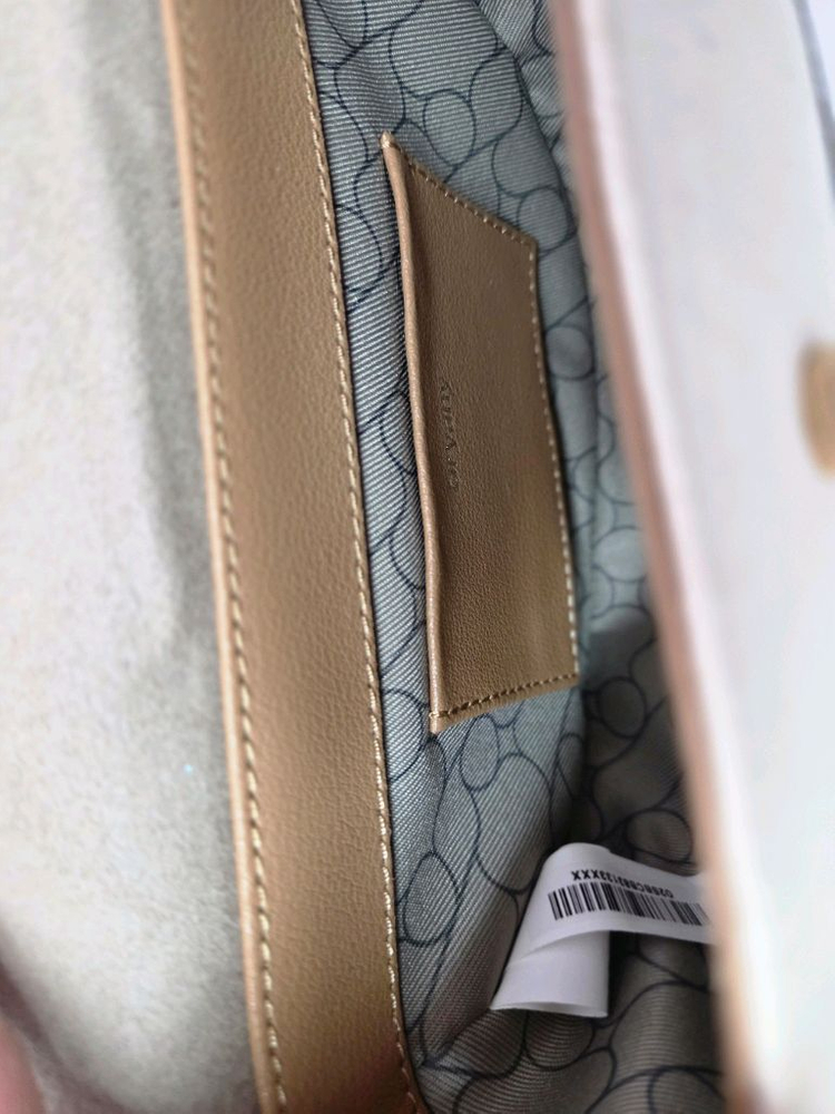 오야니 로티 캔버스 크로스바디 가방 이미지