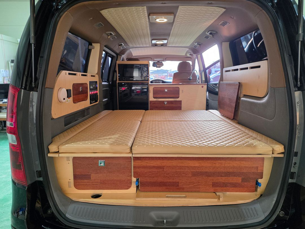 스타렉스 중고 캠핑카 , 11년식 3인승, 슬라이드방식수납함,최저가판매,엠보싱작업,냉장고전자렌지수전, 이미지