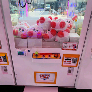 인형 뽑기 기계 이미지