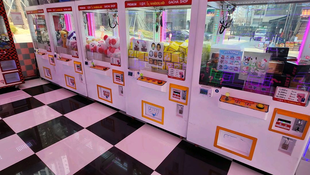 인형 뽑기 기계 이미지