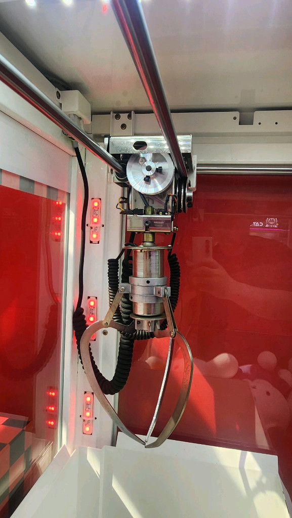 인형 뽑기 기계 이미지