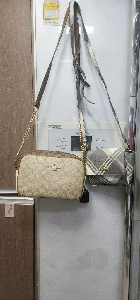 코치 체인크로스백/ 비비안웨스트우드 크로스백 이미지