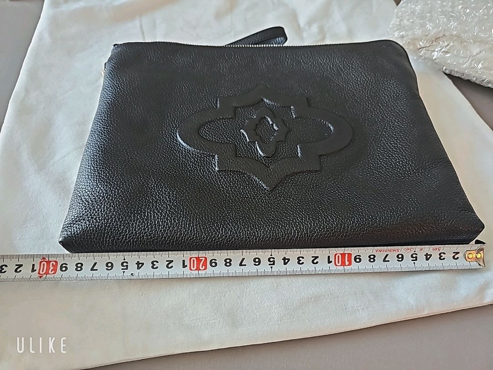 오야니 레더 클러치백 이미지