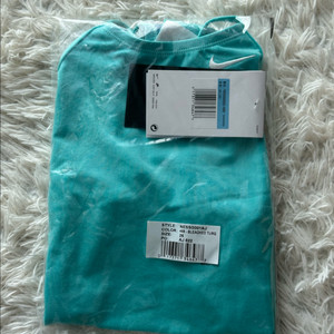 나이키스윔 미들 컷아웃 블리치드터크