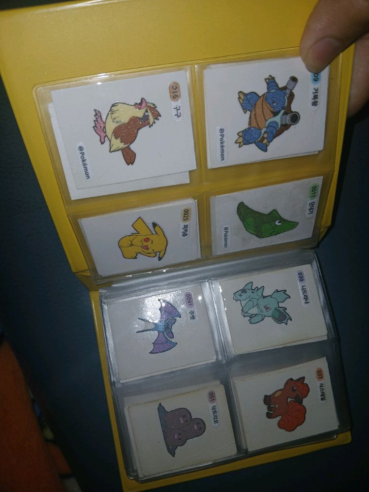 포켓몬 띠부띠부씰 묶음(보관책포함) 이미지