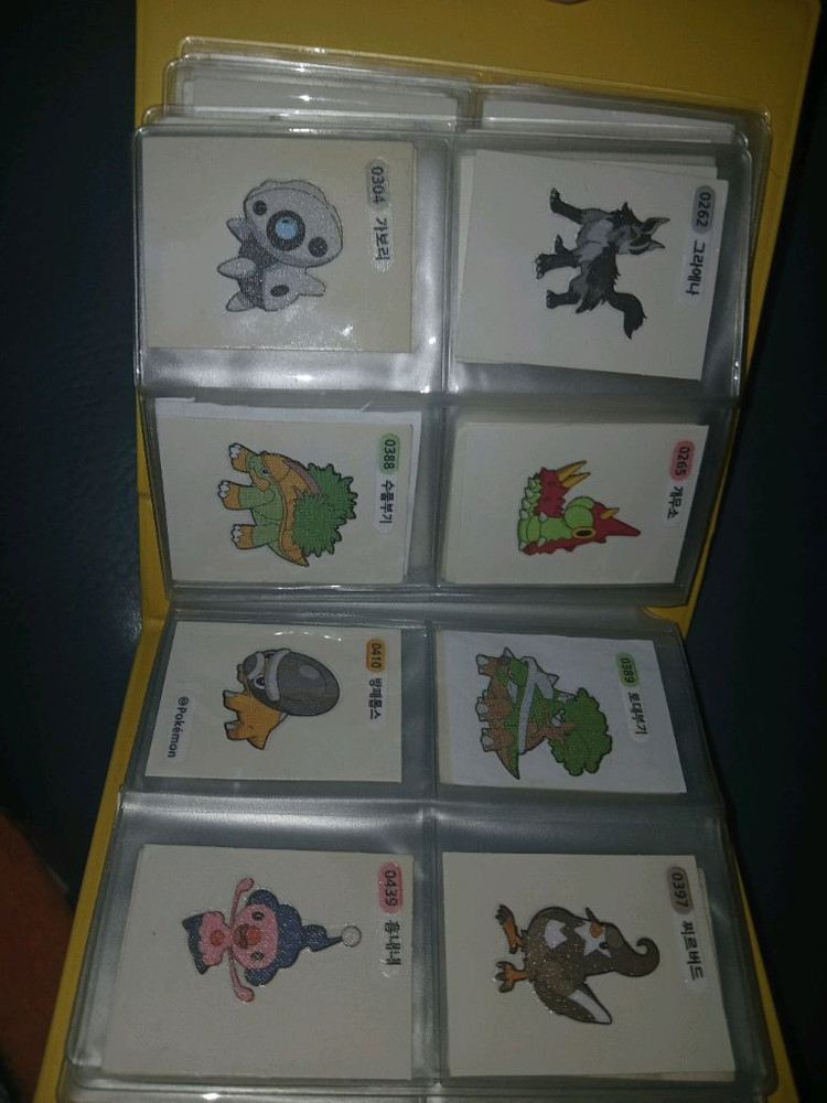 포켓몬 띠부띠부씰 묶음(보관책포함) 이미지