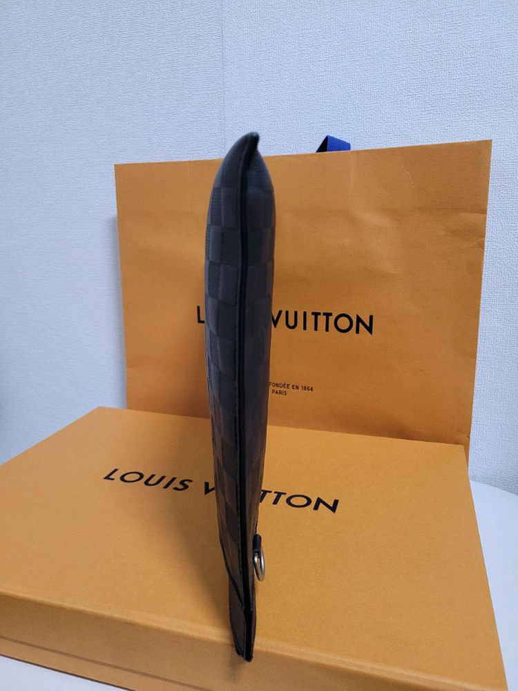 루이비통 디스커버리 다미에 인피니 포쉐트 클러치 이미지