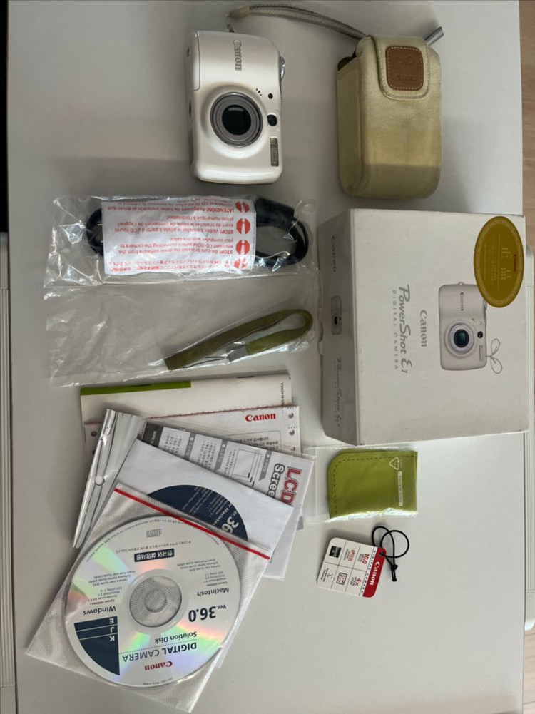 캐논 PowerShot E1 화이트 디지털 카메라 이미지