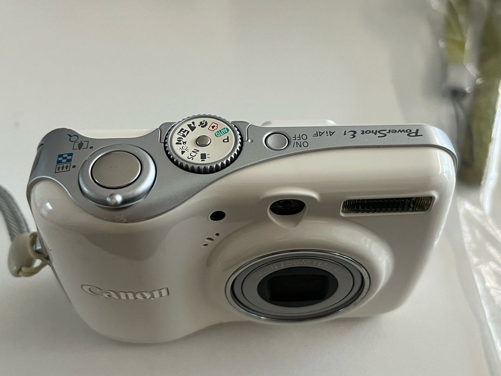 캐논 PowerShot E1 화이트 디지털 카메라 이미지