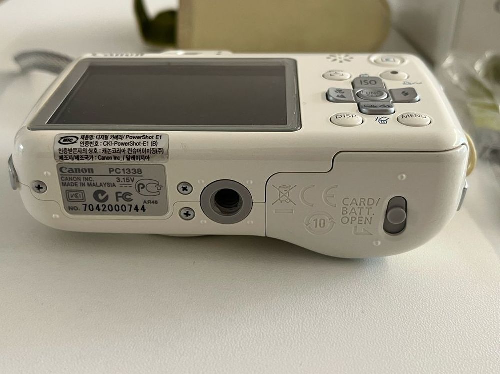 캐논 PowerShot E1 화이트 디지털 카메라 이미지