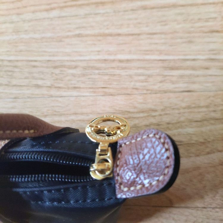 롱샴 르플리아쥬 미니 핸들 파우치 이미지