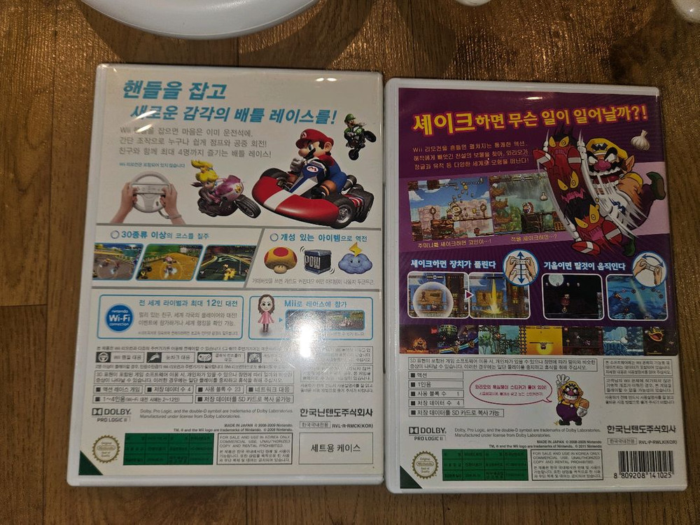 [Wii]닌텐도위 마리오카트 핸들 2개 + 인기 게임 2종 (마리오카트/와리오) 일괄판매 이미지