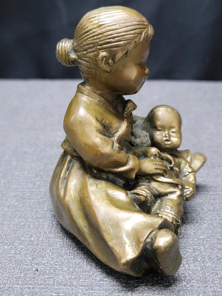 황동 엄마 모자 동브론즈 이미지