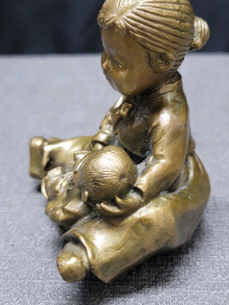 황동 엄마 모자 동브론즈 이미지