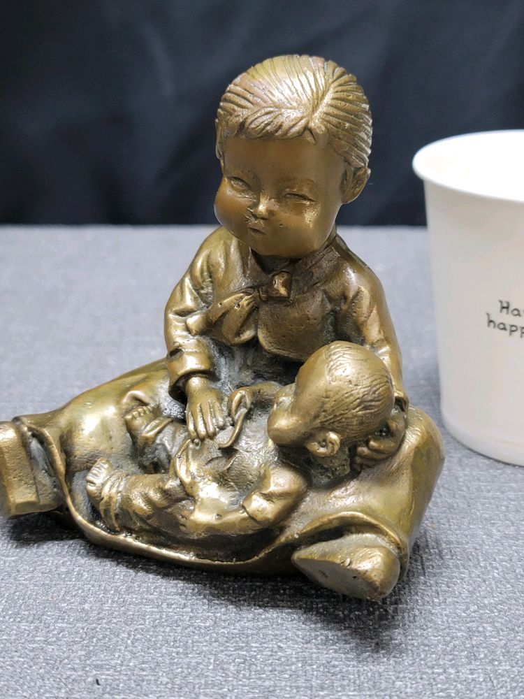 황동 엄마 모자 동브론즈 이미지