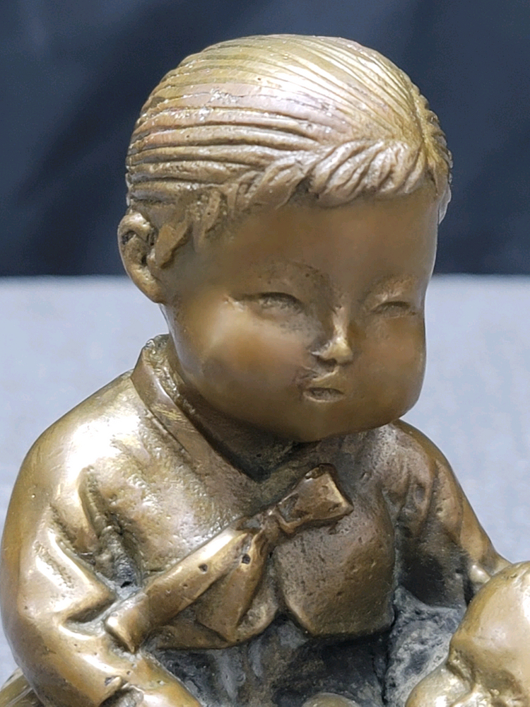 황동 엄마 모자 동브론즈 이미지