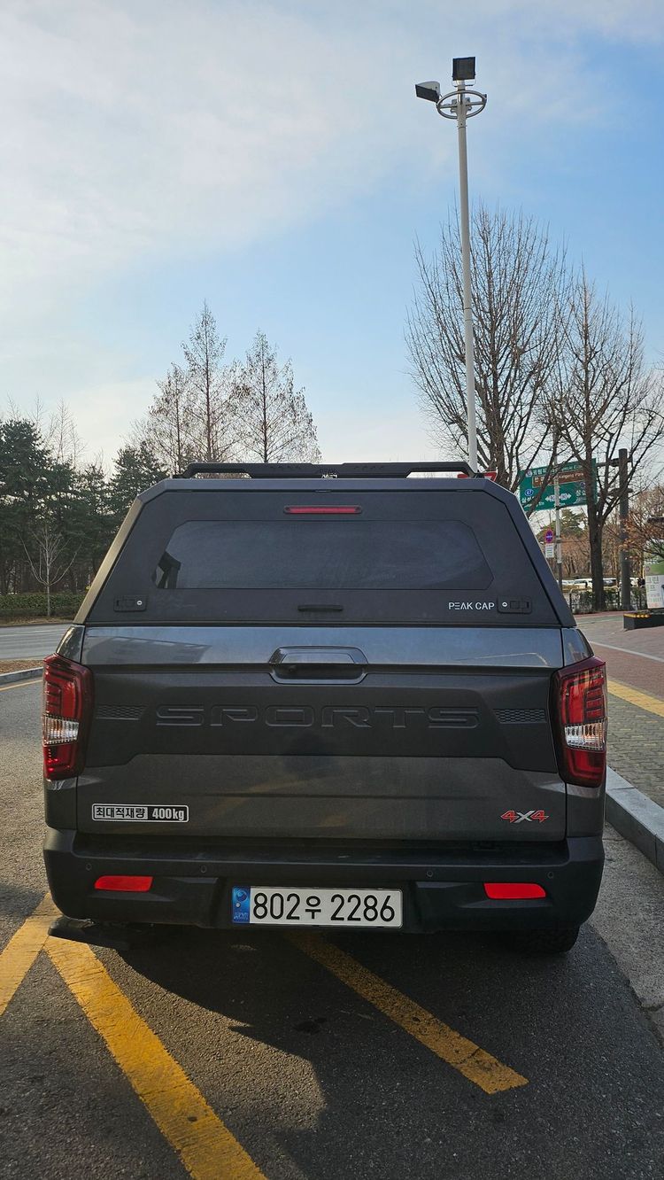 렉스턴스포츠 적재함 하드탑 피크캡 이미지