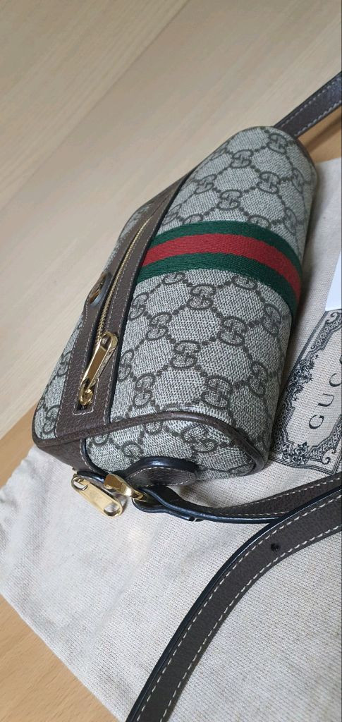 구찌 오피디아 크로스백/카메라백 미니 정품S급(감정O)프라다루이비통디올고야드샤넬셀린느보테가생로랑발렌시아가버버리가방 이미지