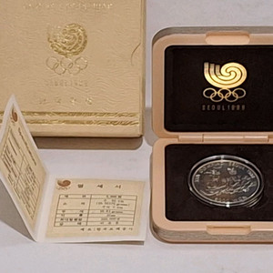 1988년 서울올림픽 1차 줄다리기 5천원 기념주화 이미지