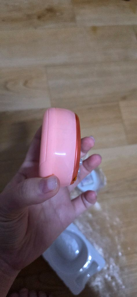 다마고치 4u+ 오렌지 및 통신폰 이미지